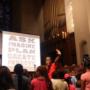 Bomani, a hip hop poet and educator, provided entertainment for the evening.
