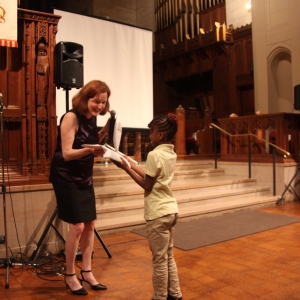 Tutoring Program Director Martha Socolar handed out certificates to the students.