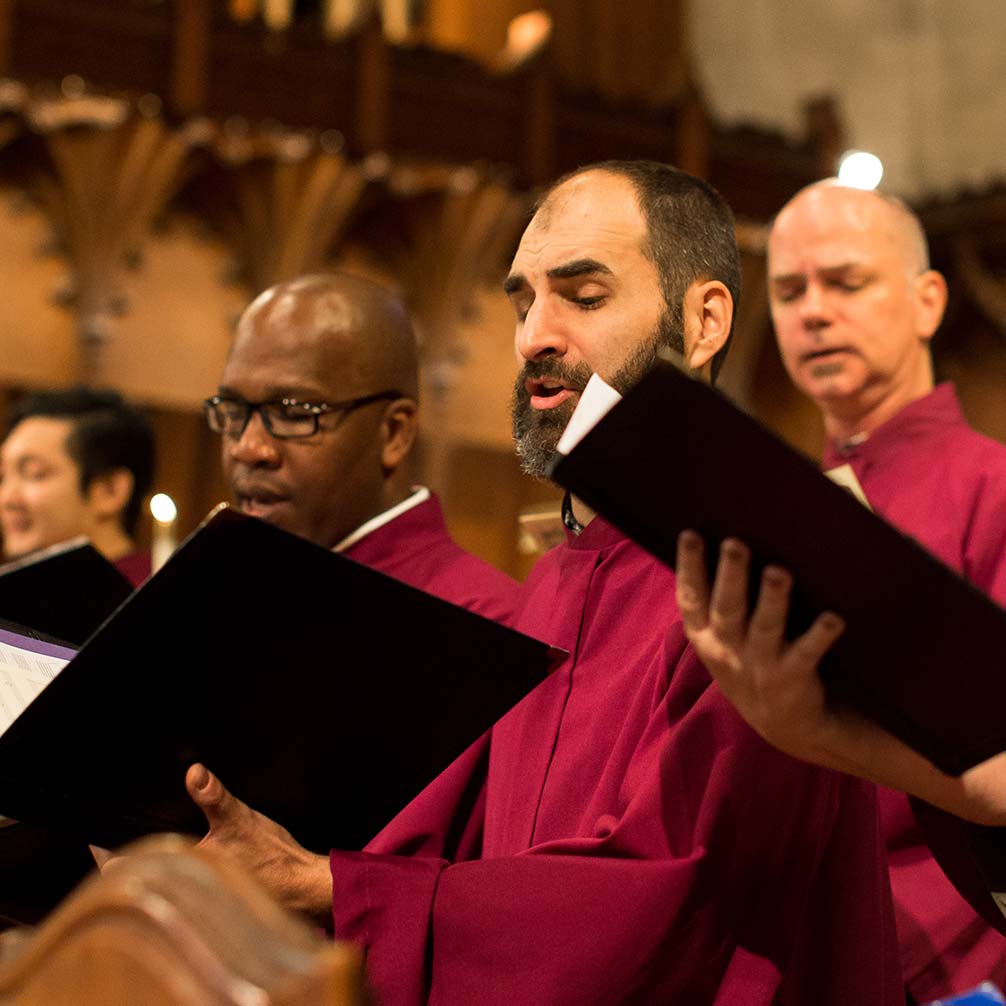 A group of men sing in Brown Memorial's Chancel Choir