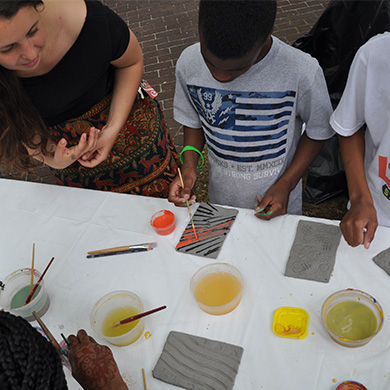 Youth make crafts during the 2015 Block Party.