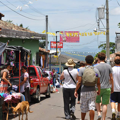 Members of Brown Memorial walk through the street in El Salvador in 2014