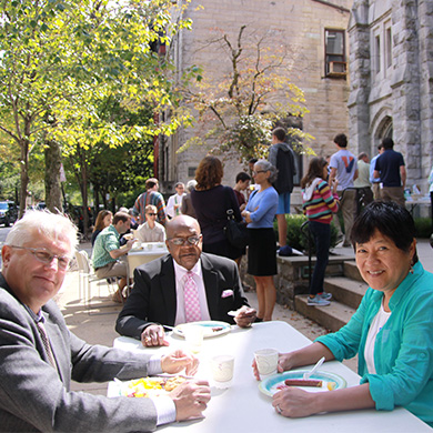 Brown members have lunch together during the 2015 Rally Day picnic.