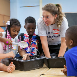 A Brown member conducts a science lesson with Eutaw-Marshburn Elementary students during the Soaring Eagles Learning Camp.