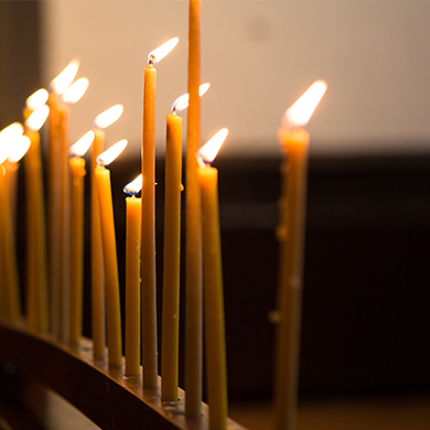 Candles burning in Brown Memorial's sanctuary.