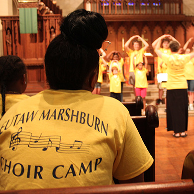 Members of the Eutaw-Marshburn Elementary choir sing in a concert in the sanctuary at Brown Memorial on July 20, 2017