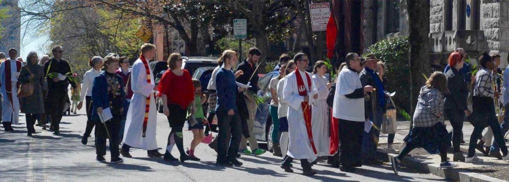 Members of Brown Memorial, Memorial Episcopal and Corpus Christi walk in the Palm Procession through Bolton Hill on Palm Sunday 2017.