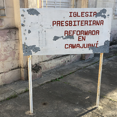 A sign in front of Iglesia Presbyteriana de Camajuani.