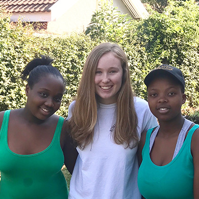 Anna Connors pictured with a couple of her friends in South Africa.
