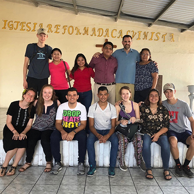 The Brown Memorial delegation to El Salvador pauses for a photo with friends in El Salvador.