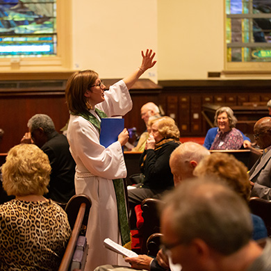 Associate Pastor Michele Ward gives a charge to the congregation during Sunday worship.