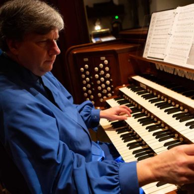 Minister of Music Michael Britt playing the Skinner organ.