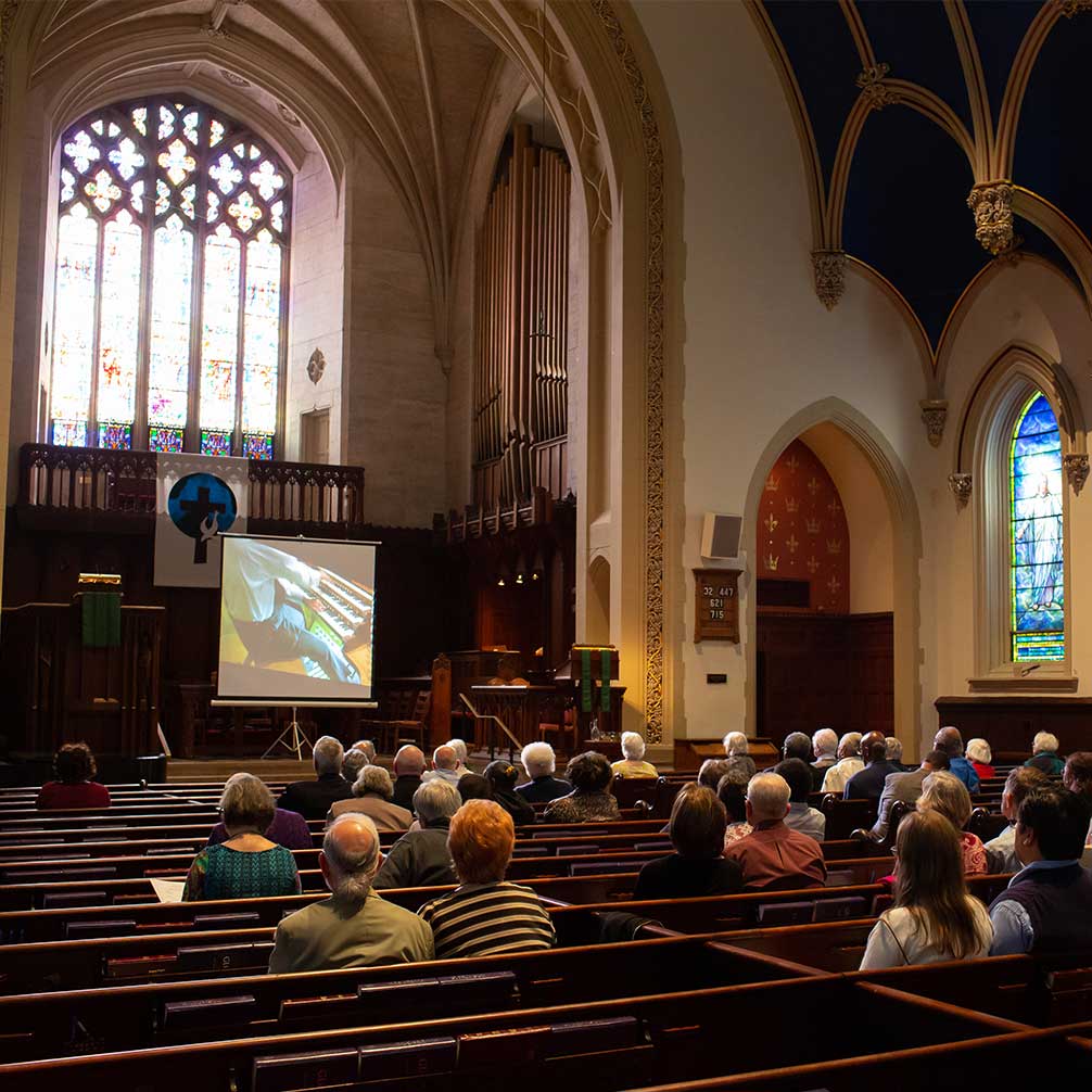 A crowd gathers in the sanctuary for a Sunday afternoon Tiffany Series concert.