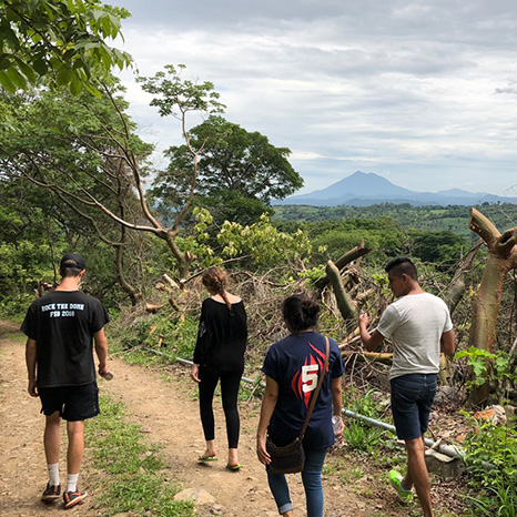 Youth group members walking in El Salvador.