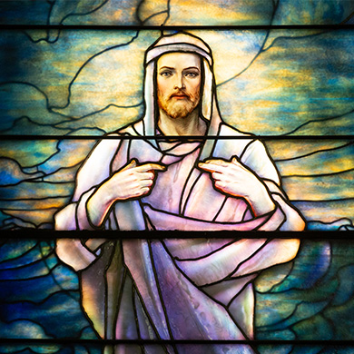 A Tiffany window showing Jesus.